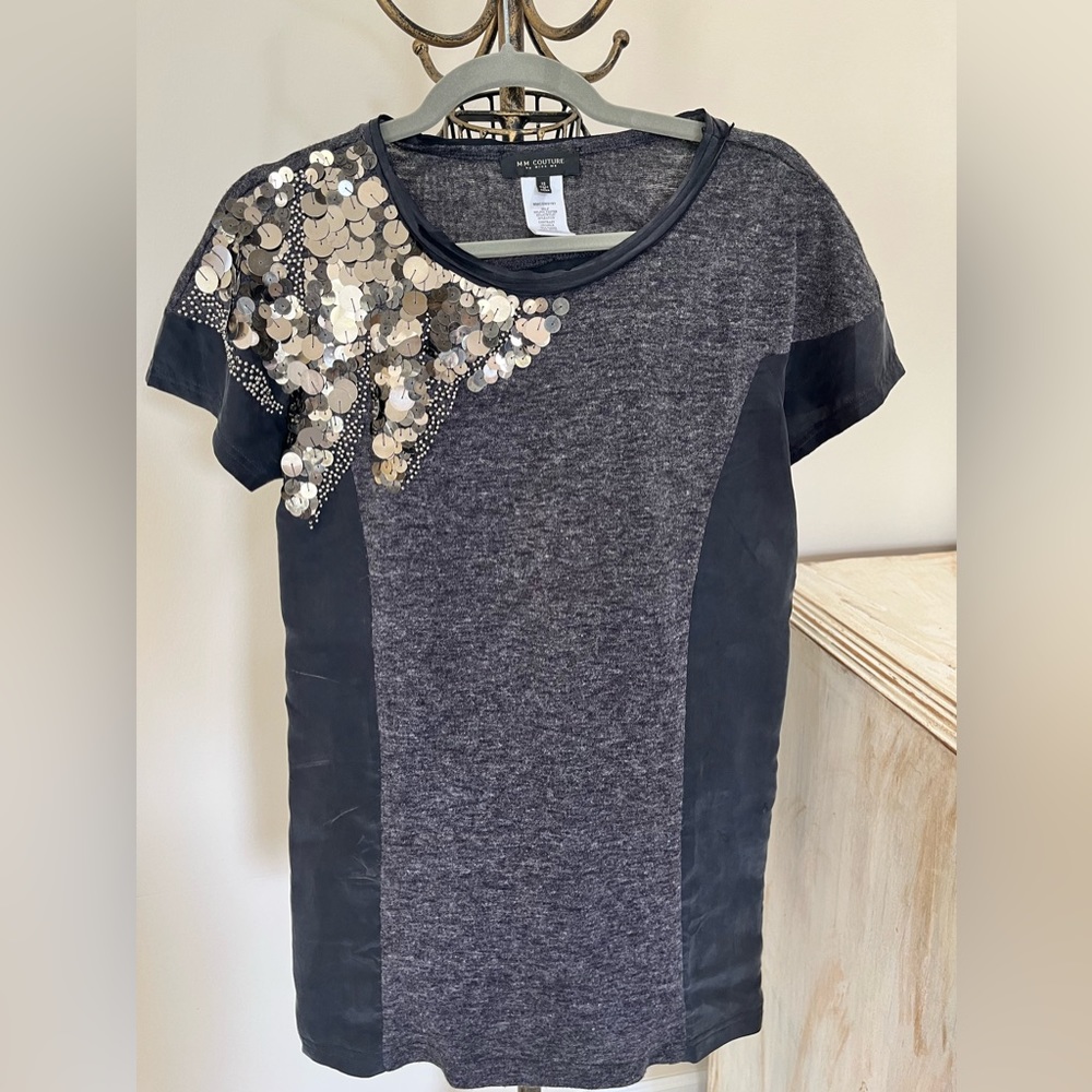 Mixed media top.